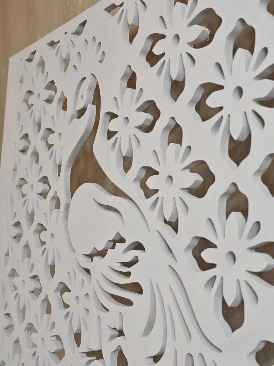 CNC-cut white WPC panel with floral and peacock decorative jali pattern for partitions